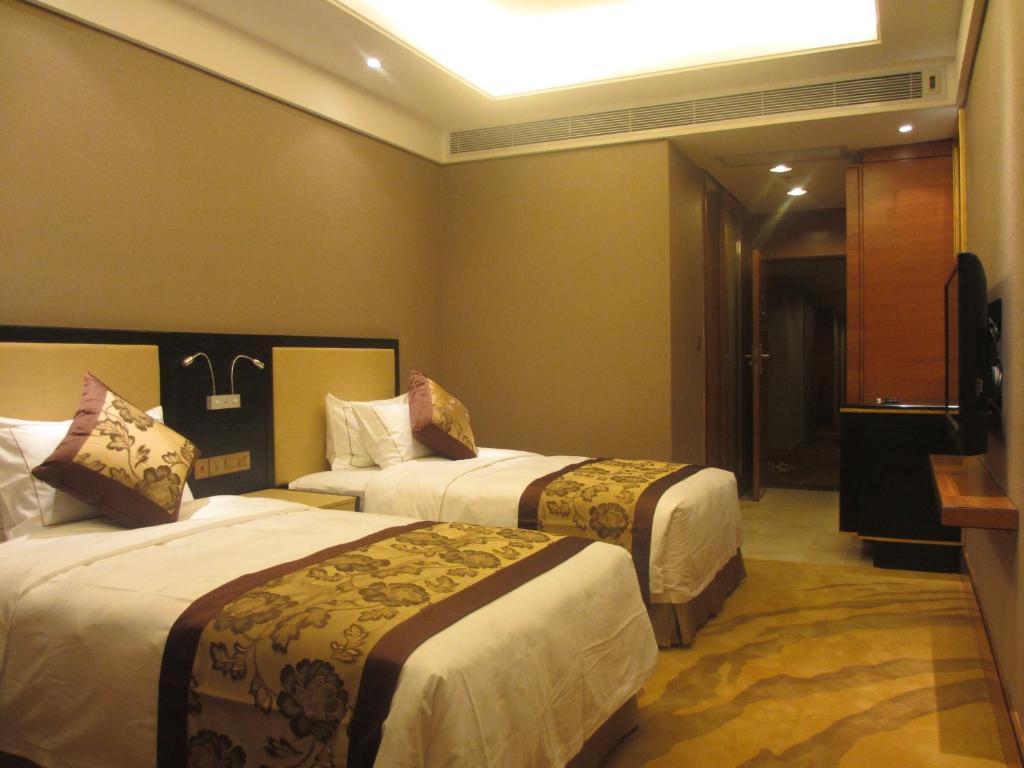 Vertical City Hotel Guangzhou Rum bild