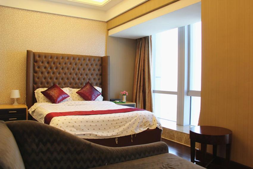 Vertical City Hotel Guangzhou Rum bild