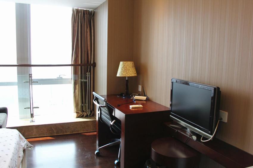 Vertical City Hotel Guangzhou Rum bild